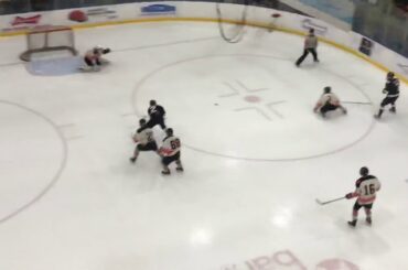 Dominic Chasse scores to give St. Dom’s 1-0 lead in Class A Championship