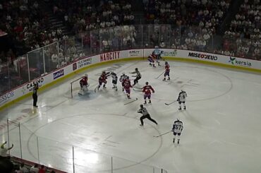 Laval Rocket's Cedric Paquette and Syracuse Crunch's Daniel Walcott rough it up in front of the net
