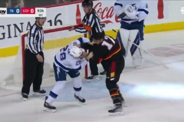 Milan Lucic and Ian Cole drop the gloves