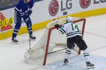 Jamie Benn lifts net, tries to poke check under it