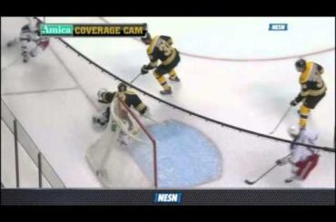 Tuukka Rask makes a save after Dougie Hamilton's defensive mistake
