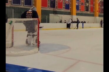 Yaroslav Askarov clears snow from his crease at Nashville Predators Development Camp 2022