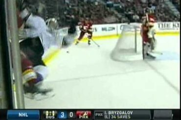 Mark Giordano flattens Dustin Brown