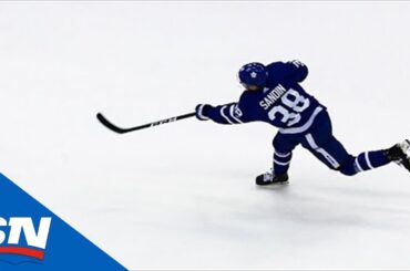 Hyman Tips Sandin's Shot To Score With 3 Seconds Left In The Period