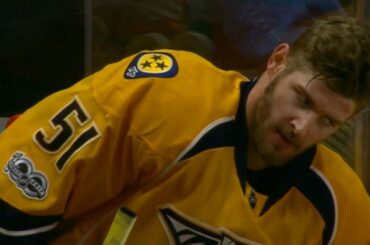 Watson with no helmet and no stick still tries to block shot