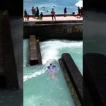 SURFER GETS SUCKED INTO STORM DRAIN #shorts