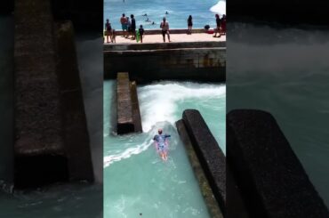 SURFER GETS SUCKED INTO STORM DRAIN #shorts
