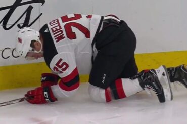 Devils' Mueller appears shaken up after hit by Blackhawks' Hayden, leaves game