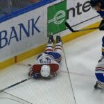 Byron helped off the ice after Parayko shoves him into the boards