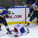 Desharnais injured throwing hit in corner, leaves game