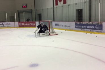Winnipeg Jets goalie Eric Comrie doing some RVH work before practice. Buffalo Sabres, Jamie McGuire