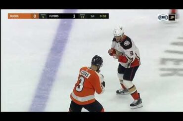 Kevin Bieksa knocks down Radko Gudas with a Superman punch