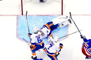 Varlamov's three spectacular pad saves deny Fast in front