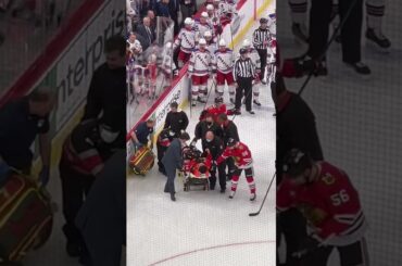 Thumbs up from Jujhar Khaira as he is taken off the ice on a stretcher.