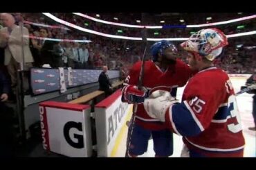 P.K. Subban lays a kiss on Dustin Tokarski