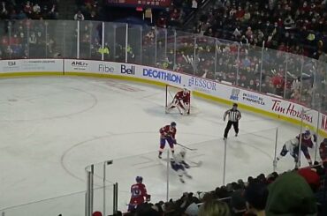 Devante Stephens of the Abbotsford Canucks scores vs. the Laval Rocket 3/4/22
