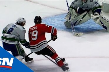Jonathan Toews Goes Inside-Out On Chris Tanev For Slick OT Goal