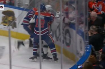 Hyman hit on Lizotte