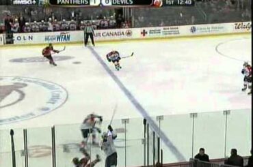 Dimitry Kulikov flattens Patrick Elias