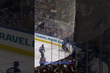 Jake McCabe drives Derek Ryan heavily into the boards