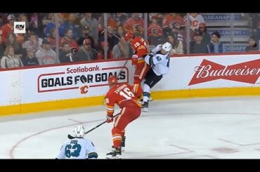 Chris Tanev and Matthew Tkachuk 3rd Period Hits vs San Jose Sharks | March 22 2022