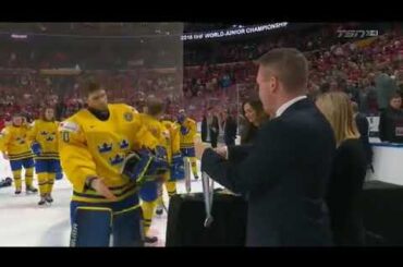 Lias Andersson throws silver medal at a fan at the world juniors