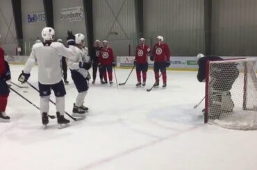 Conor Hellebuyck vs Patrik Liane at Jets practice. Loser buys?