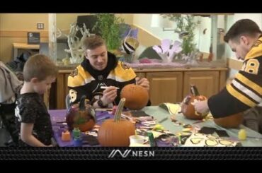 Bruins Players Decorate Pumpkins With Young Patients
