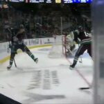 Charlie McAvoy crushes Trevor Zegras against the boards