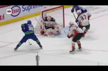 Andrei Kuzmenko scores vs Ducks, his 30th goal of the rookie season (8 mar 2023)