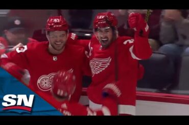 Red Wings' Dylan Larkin Snipes the Short-Side Top Corner to Beat Flames' Daniel Vladar