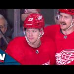 Red Wings' Lucas Raymond Makes Nifty Move Behind Net to Slip Puck Past Blue Jackets' Spencer Martin