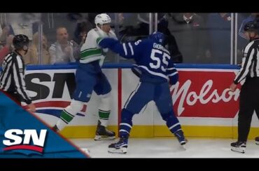 Maple Leafs' Giordano Goes the Distance with Canucks' Joshua After Big Hit on Kampf