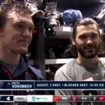 Kirill Marchenko helps translate for Dmitri Voronkov after Columbus Blue Jackets' win vs. Lightning