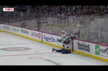 Andreas Englund smashing Cole Perfetti's face-first into the boards. Very Dangerouns