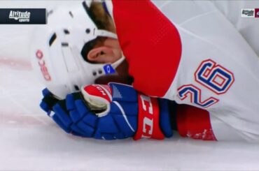 Nazem Kadri's Stick catches Jeff Petry's face