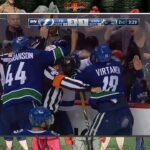 Gudbranson and Virtanen stand up for their boy Troy Stecher