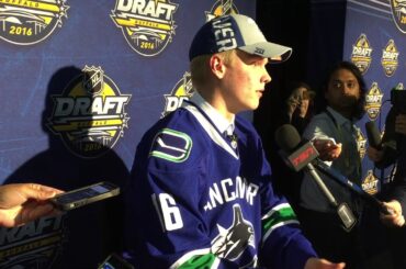 Canucks pick Olli Juolevi talks to media