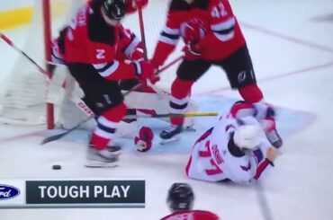 Devils D #2 Brendan Smith drills TJ Oshie & Tom Wilson. 2-Solid Checks.