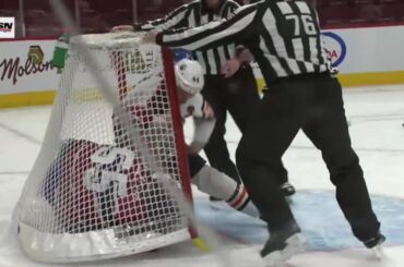 Zack Kassian knocks Pezzeta to the back of the net