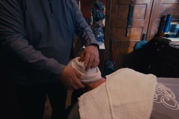 Jim Perunovich gets a pregame shave
