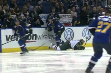 Erik Johnson levels Cal Clutterbuck