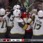 Paul Cotter slams Tkachuk down to the ice