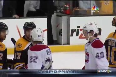 Milan Lucic talks to Dale Weise, Alexei Emelin in handshake line