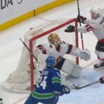 Sens' Bernard-Docker Catches Puck, Avoids Penalty After Canucks' Hoglander Attempts Pass Over Net