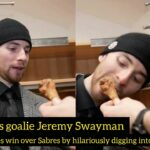 Bruins goalie Jeremy Swayman celebrates win over Sabres by digging chicken wings in an interview