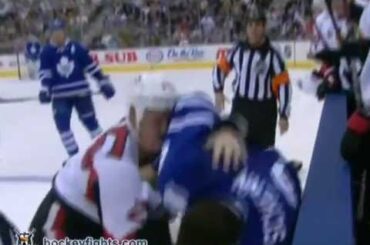 Chris Neil vs Luke Schenn Oct 8, 2011