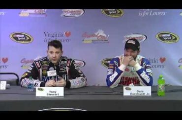 Dale Earnhardt Jr. tries not to laugh as Tony Stewart insults reporter