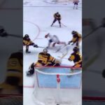 Penguins G #39 Alex Nedeljkovic putting on a goalie clinic.