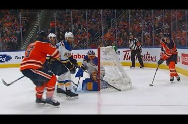 Nugent-Hopkins feeds Caggiula with sneaky pass to stun Blues